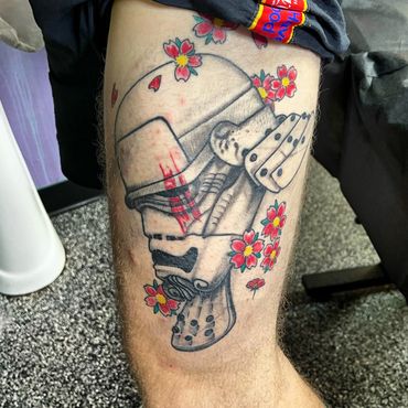 Black and gray guitar and flowers tattoo