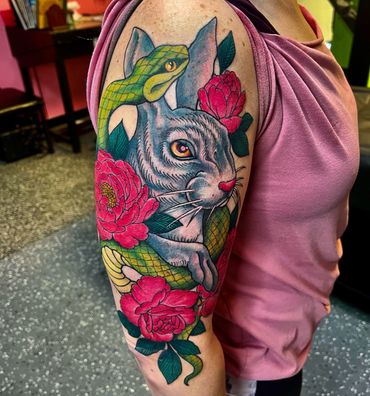 Colorful rabbit and roses tattoo