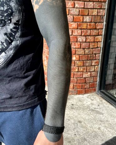 Blackout sleeve tattoo