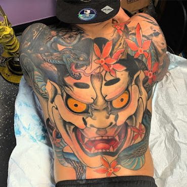 Japanese Hannya mask back tattoo